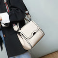 Women's genuine leather messenger bag in horizontal square shape with oil wax finish and multiple internal compartments