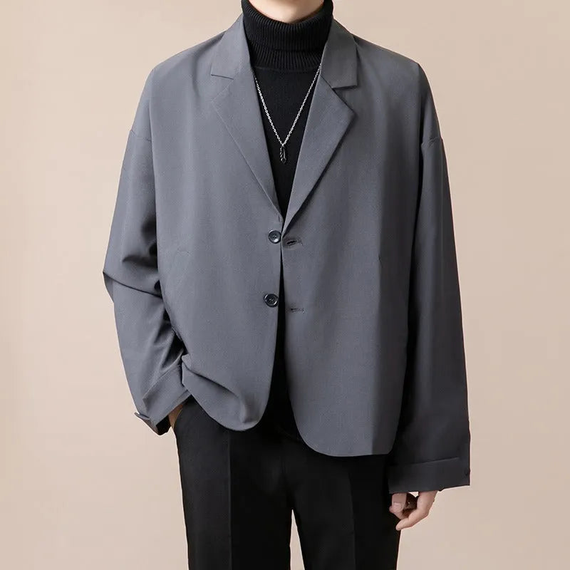 Men's loose fit casual suit jacket in polyester blend fabric available in four colours