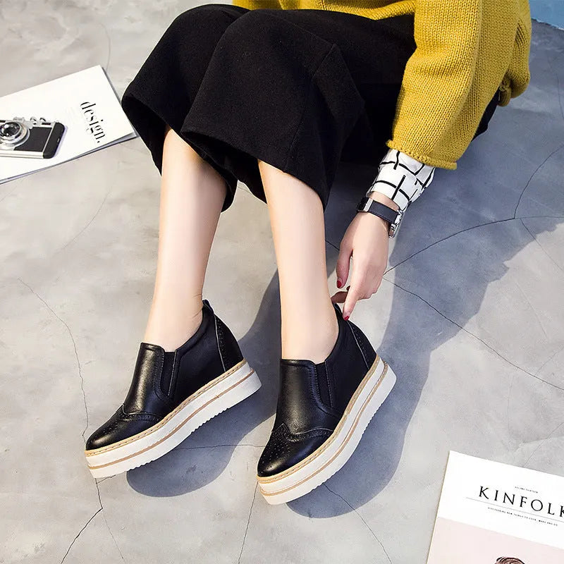 Women's genuine leather brogue platform shoes with metal detail and round toe in black