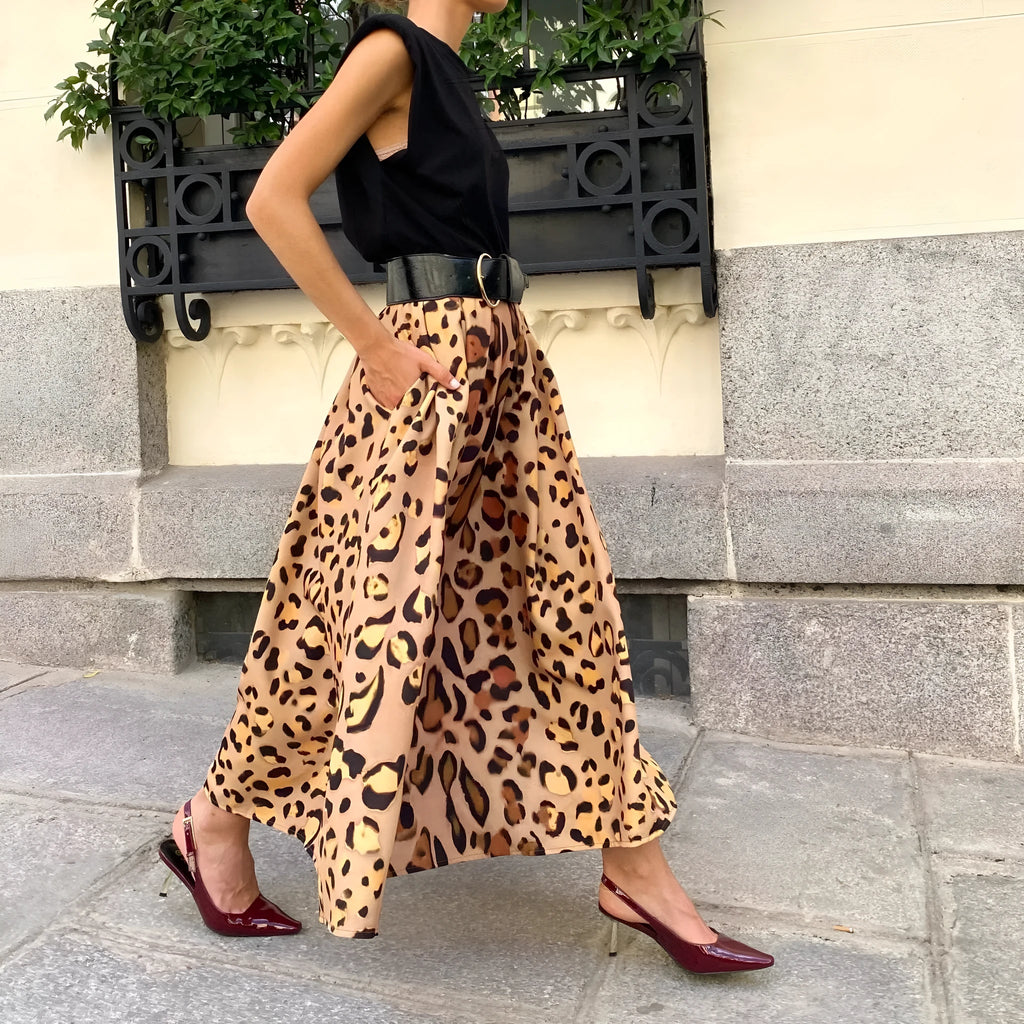 Brown leopard print women's A-line long skirt with big hem design on hanger