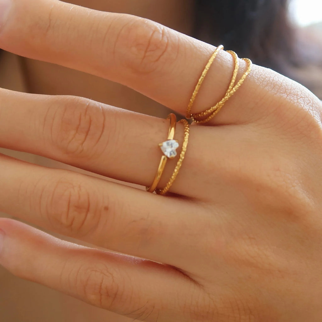 Golden heart or oval stainless steel ring with heart shape design available in sizes No 5 to No 8