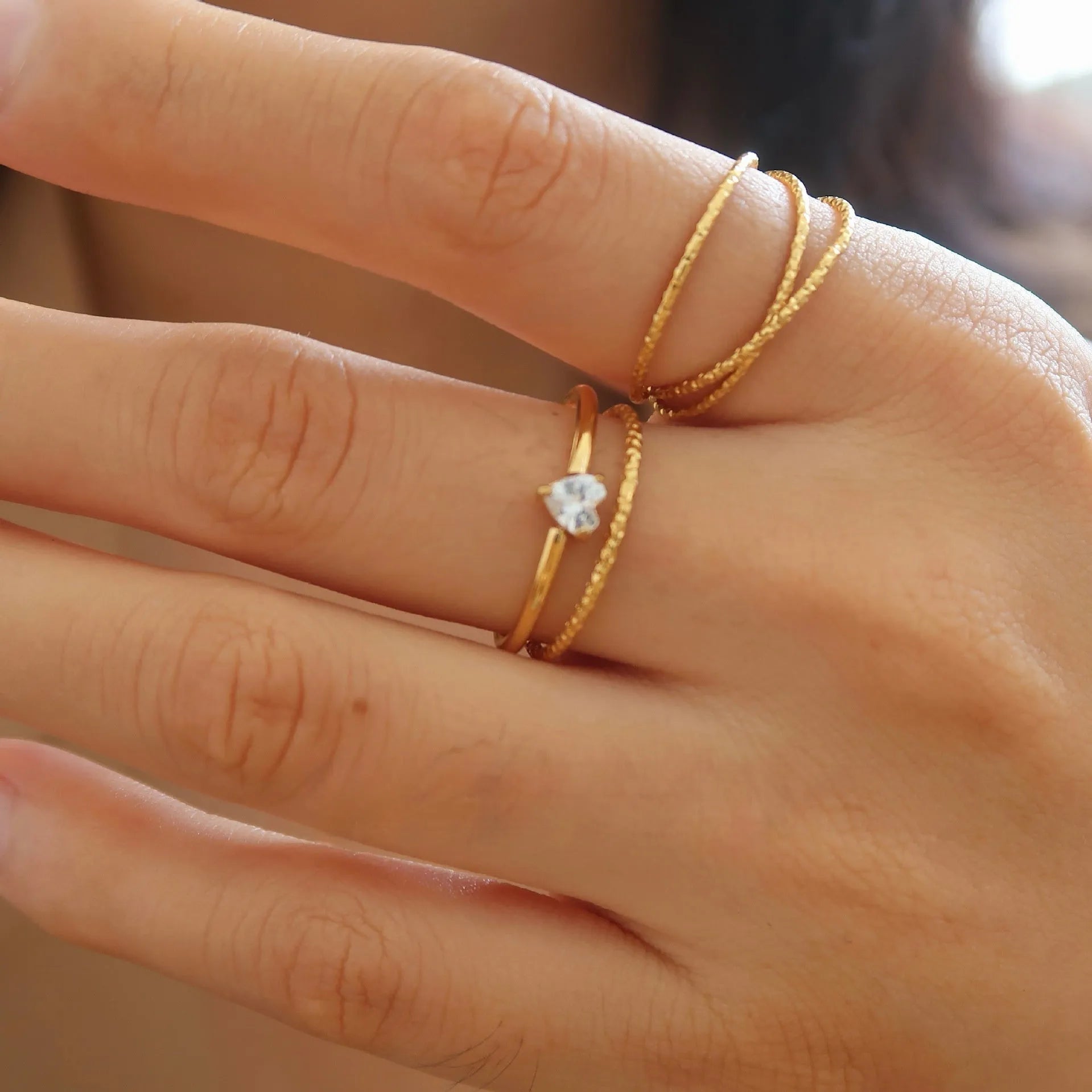 Golden heart or oval stainless steel ring with heart shape design available in sizes No 5 to No 8