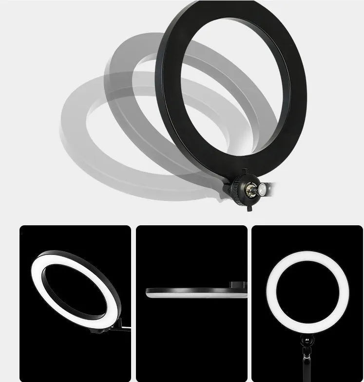 Black aluminium alloy and ABS mobile phone tablet stand with built-in fill light, folded vertical orientation on a table