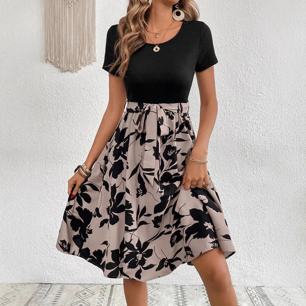 Women's khaki A-line dress with plant pattern and shoulder strap detail