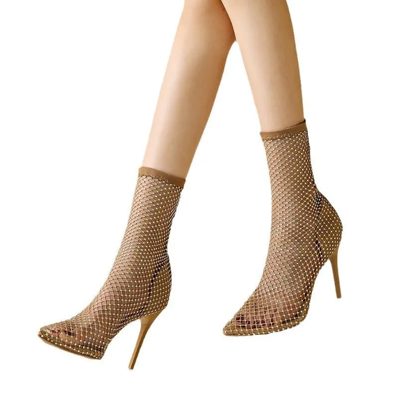 Gold mesh high heel sandals with pointed stiletto design showing oversleeves wearing method