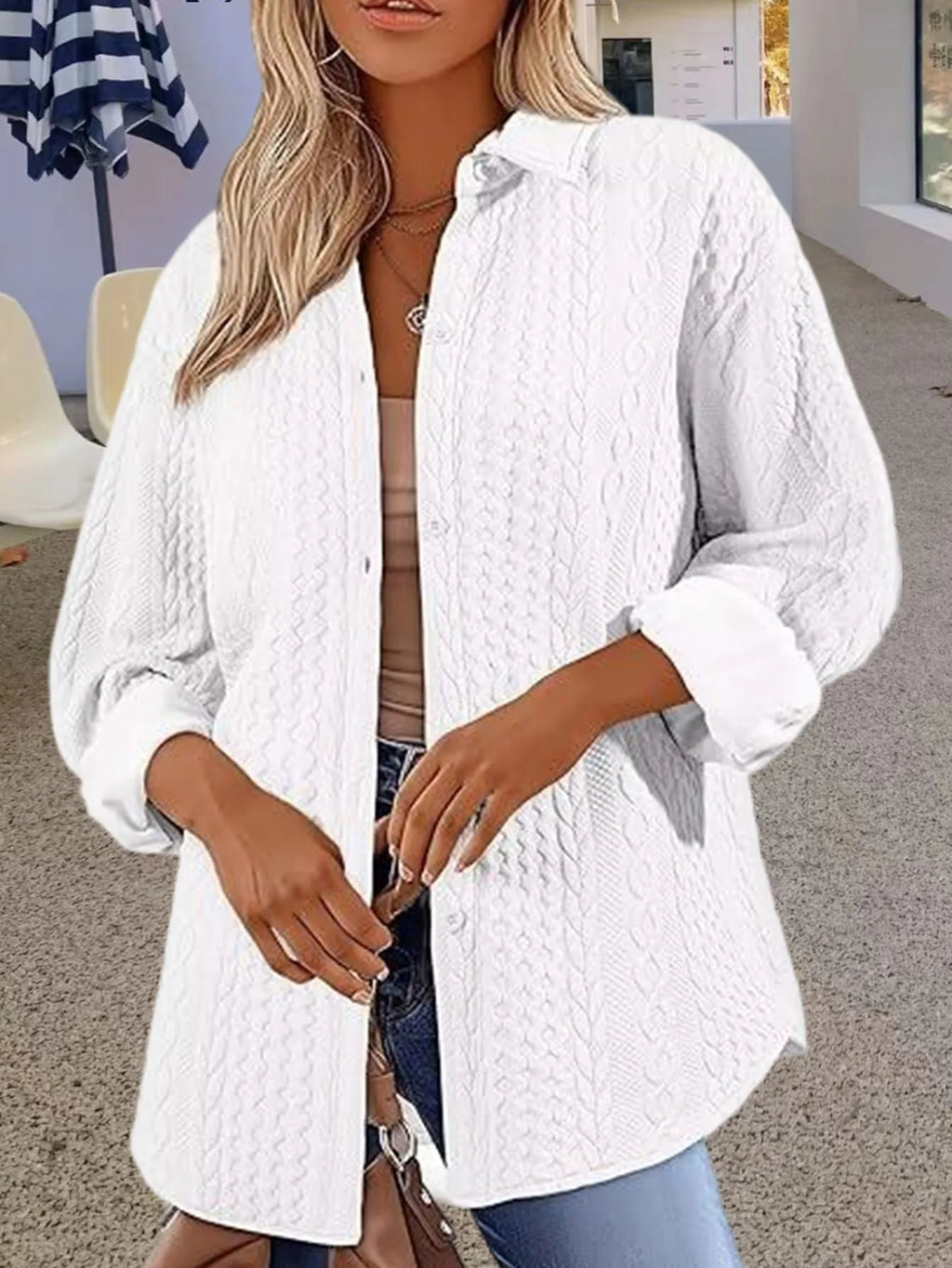 Women's solid colour long sleeve knitted cardigan sweater on a hanger