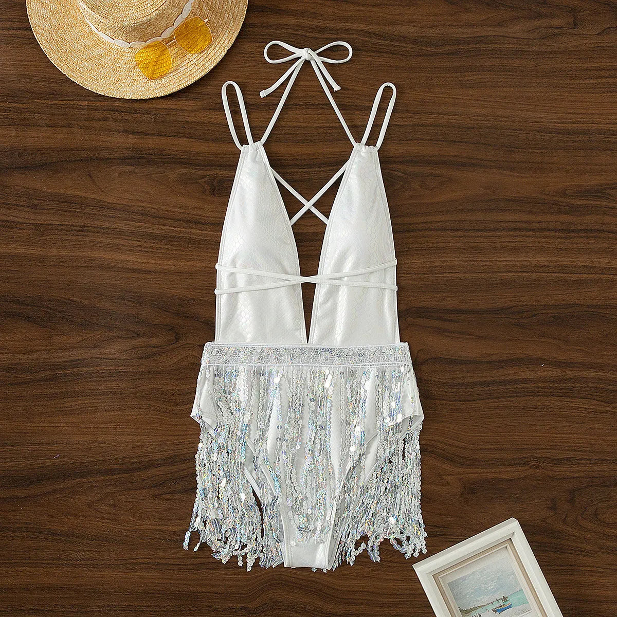 White deep V-neck one-piece swimsuit with front tassel decoration