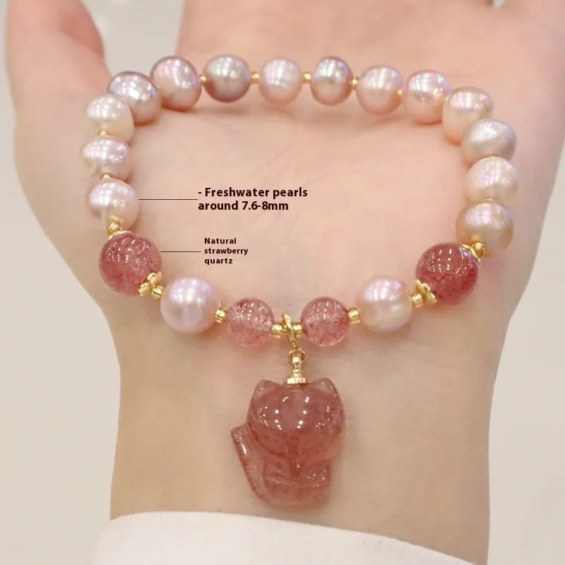 Women's natural freshwater pearl bracelet with light pink pearl, strawberry quartz, and fox charm on string