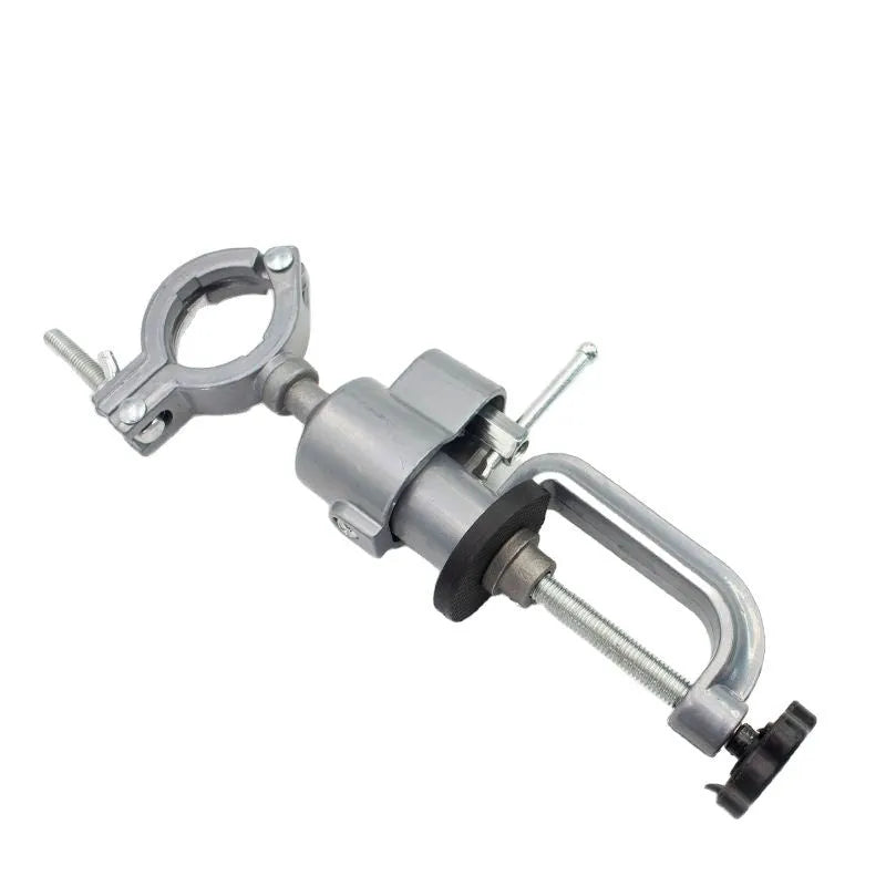 Clamp-on bench vise with 360-degree rotating head and tungsten steel pliers on a workbench.