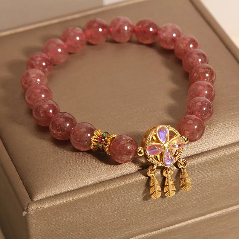 Natural strawberry quartz bracelet with four-leaf clover dream catcher ball pendant on adjustable string