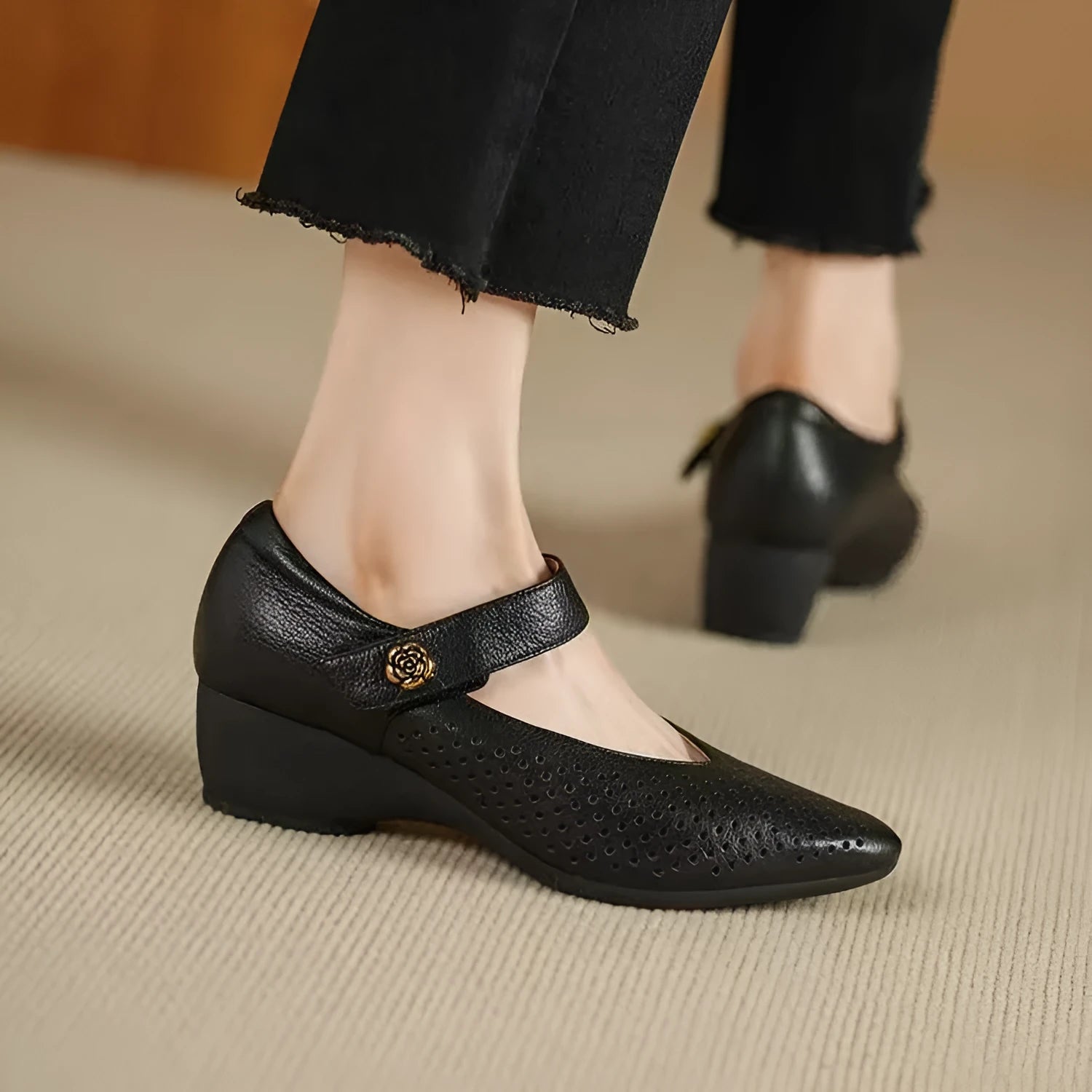 Women's black wedge high heels with pointed toe, PU upper, and hook-loop strap against a white background
