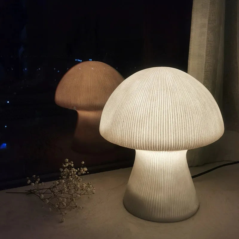 Nordic style handmade sandstone bedside table lamp with adjustable three-color light on a bedroom side table