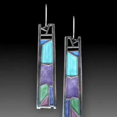 Water drop irregular oil color silver alloy women's drop earrings on white background