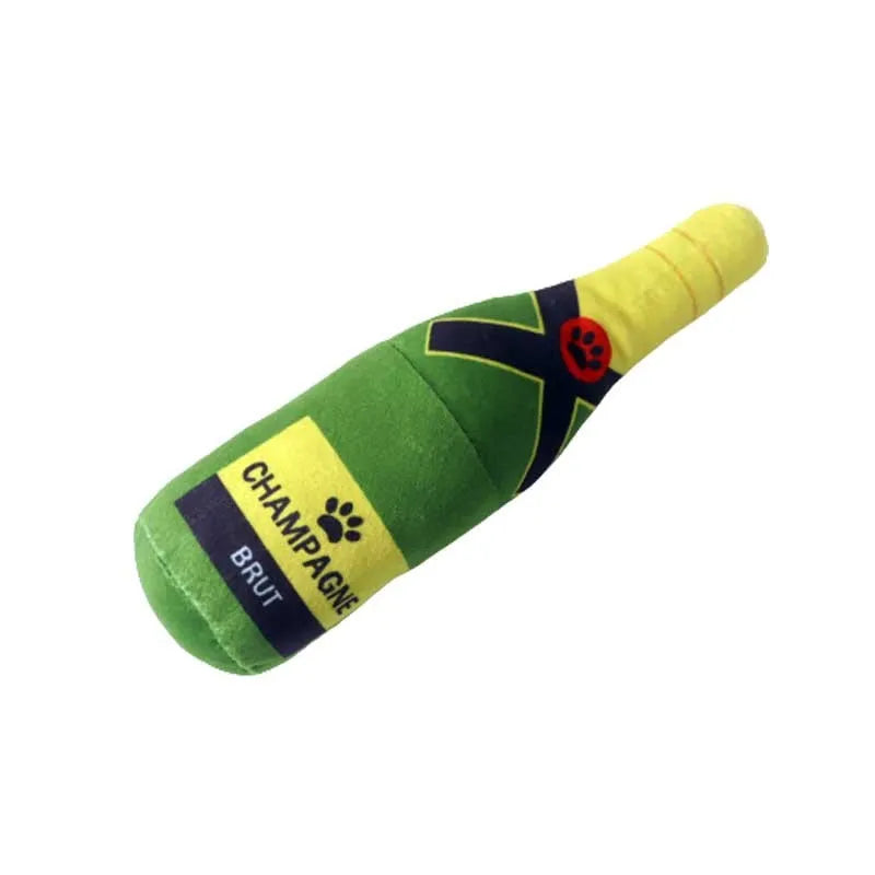Green plush wine bottle shaped pet toy on a white background