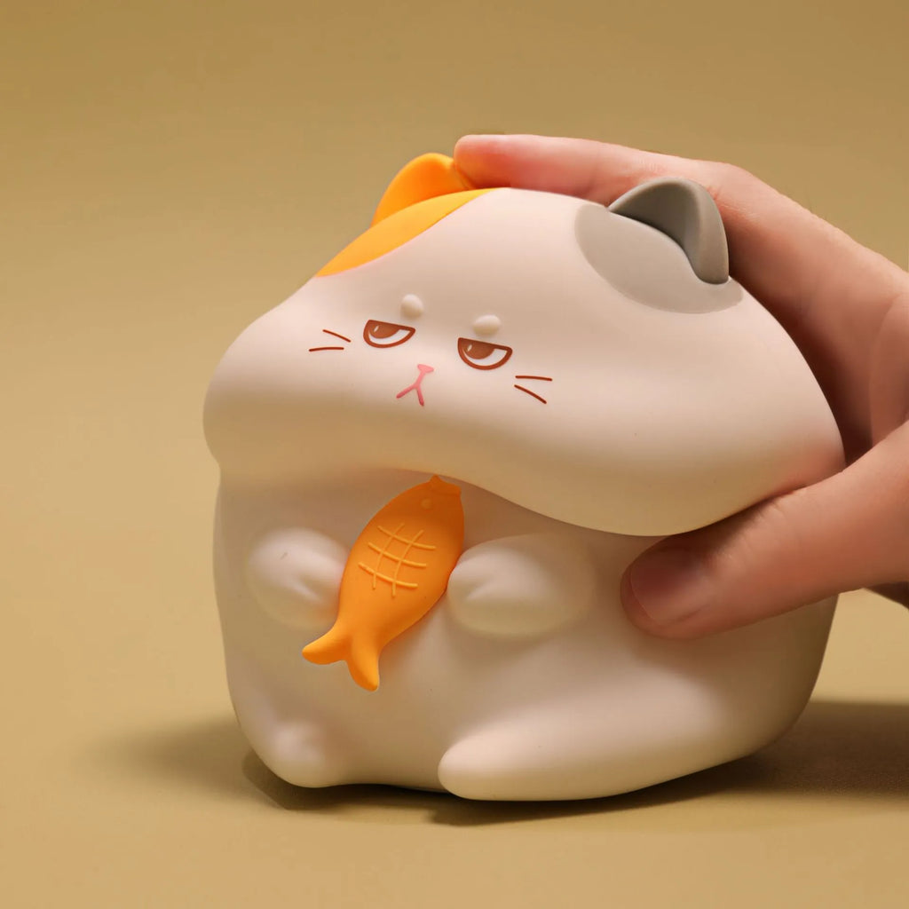 Greedy Cat small desktop night light in whitebait style with cartoon cat shape and LED glow