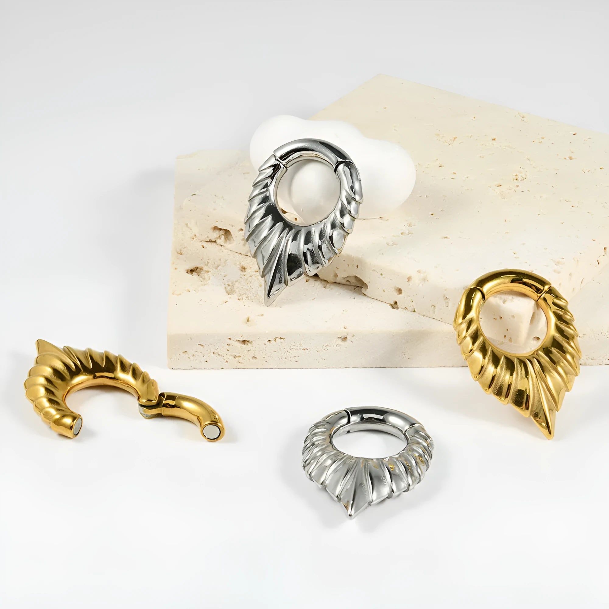 Stainless steel drop-shaped auricle ear extender with tribal totem design in four style variations