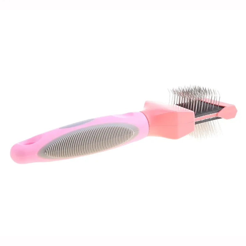Blue double-sided pet brush with stainless steel pins and ergonomic grip on a white background