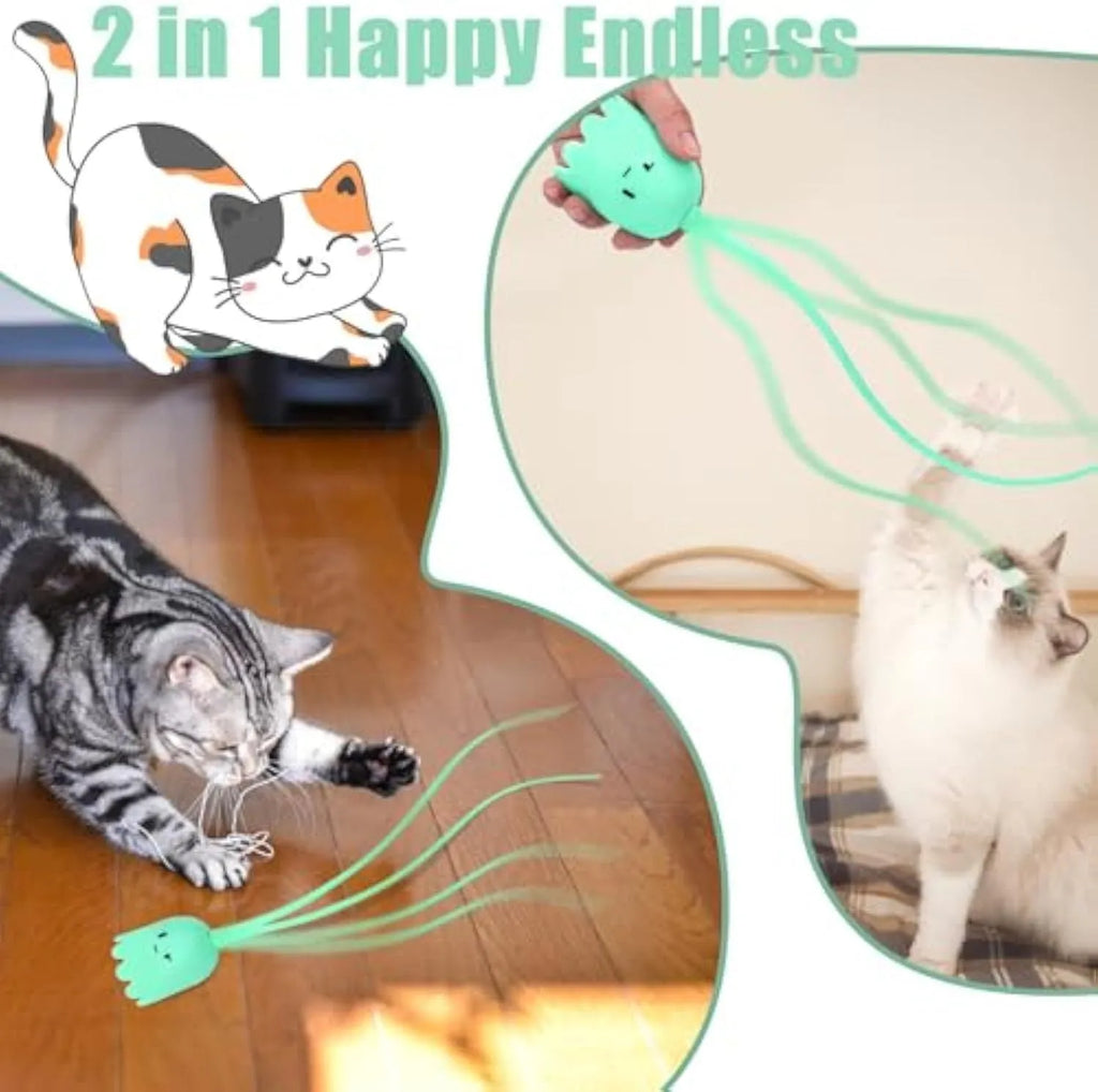 Green automatic electronic cat wand toy with a swinging silicone tail on a wooden floor.