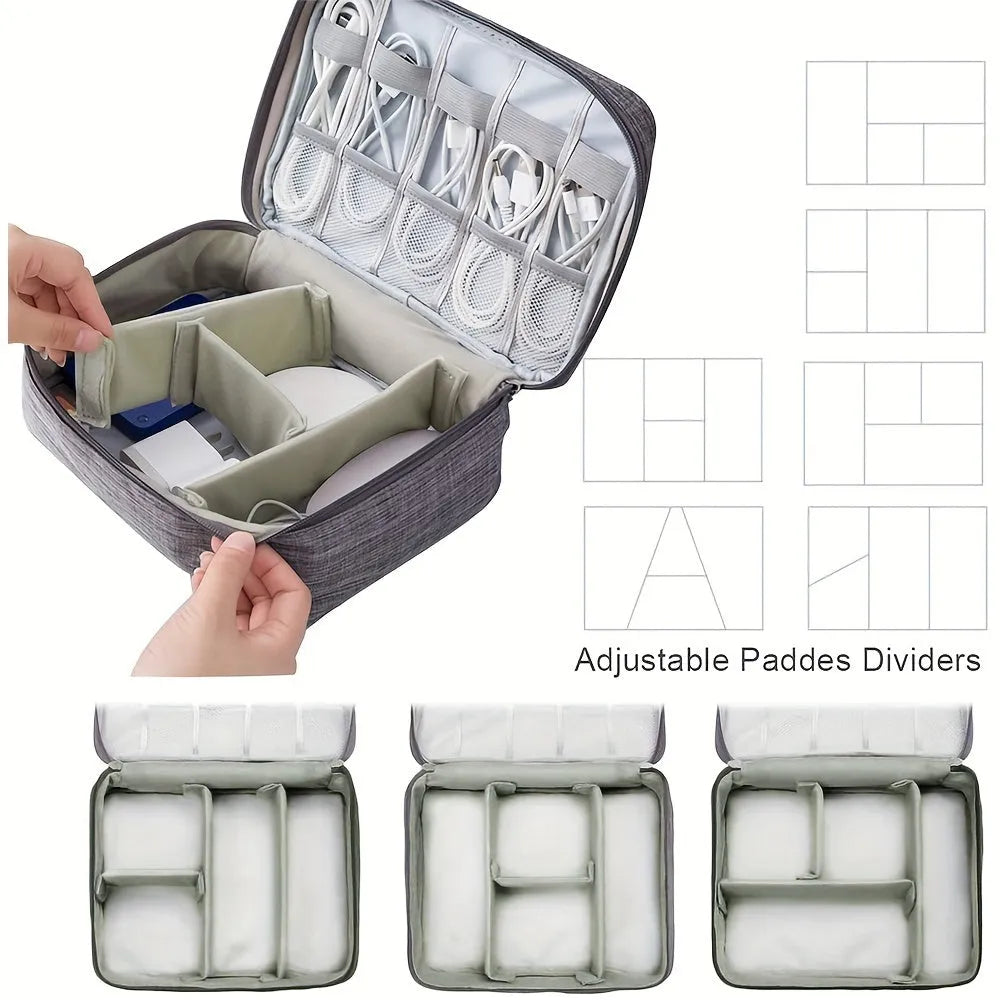 Black travel electronics organiser case with mesh pockets, elastic loops and removable padded dividers