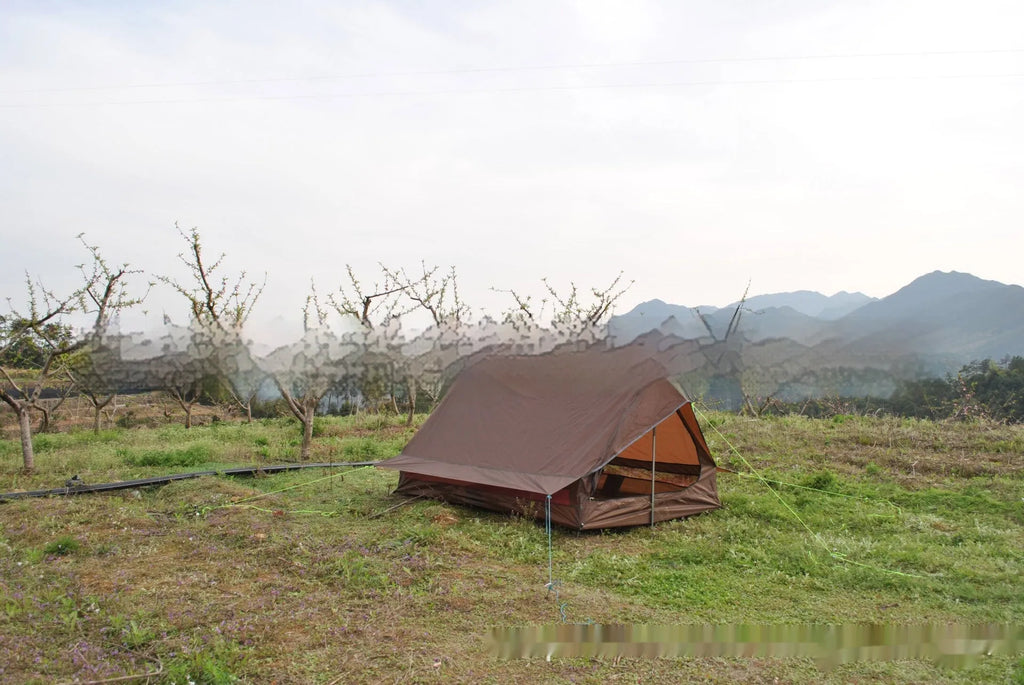 Brown or white A-line pole-free tent pitched with hiking canes showing 210x150x110cm dimensions