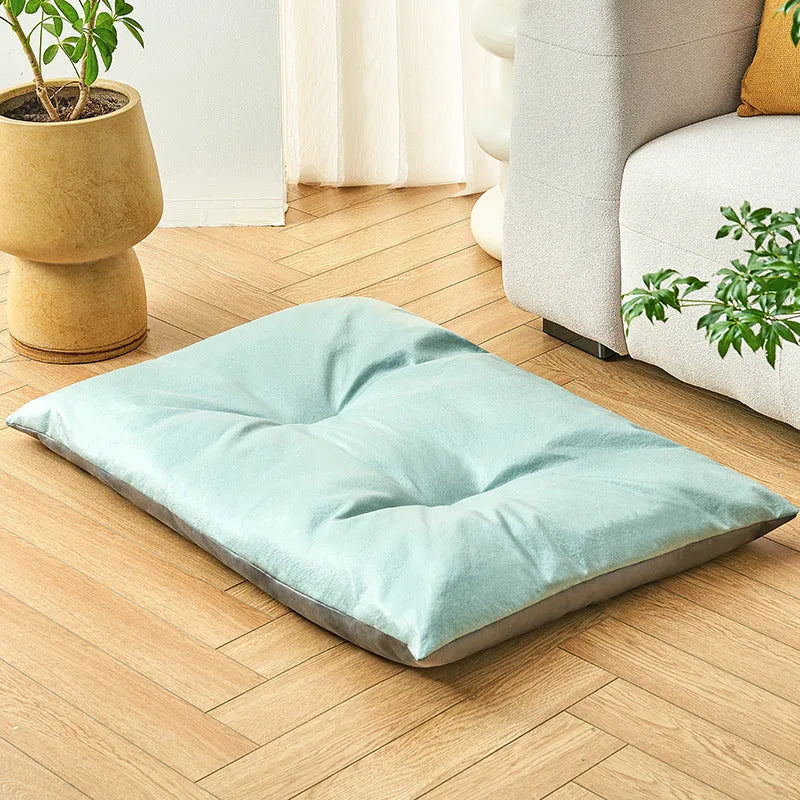 Cool summer cat nest sleeping mat in blue, size M, on a light floor