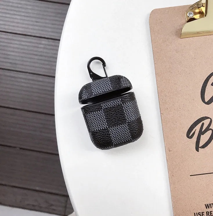 Leather look hard shell phone case for iPhone XS MAX with a hook for AirPods 2 case, shown in a grid pattern.