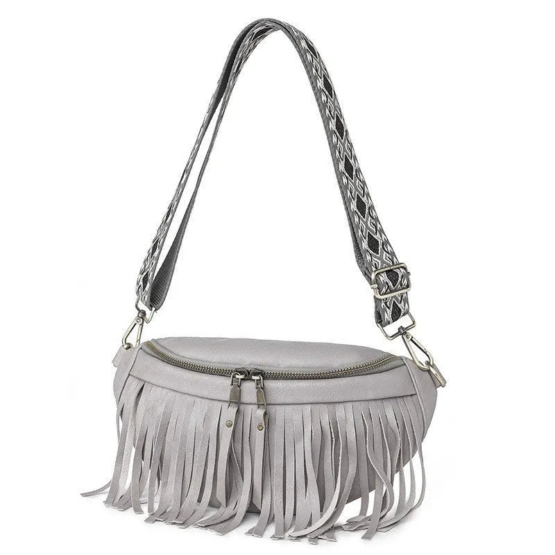 PU leather messenger bag with tassel and pleated chest design, available in multiple colours, on a plain background.