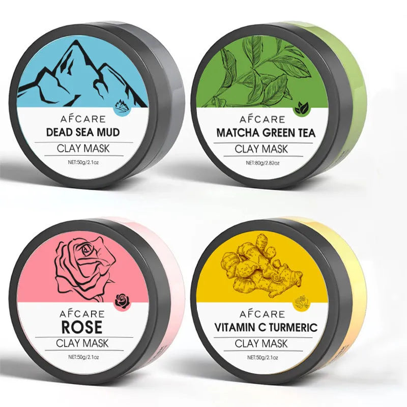 4 pack of clay face masks with Dead Sea mud, green tea, turmeric, and rose clay, each 80ml, on a white background