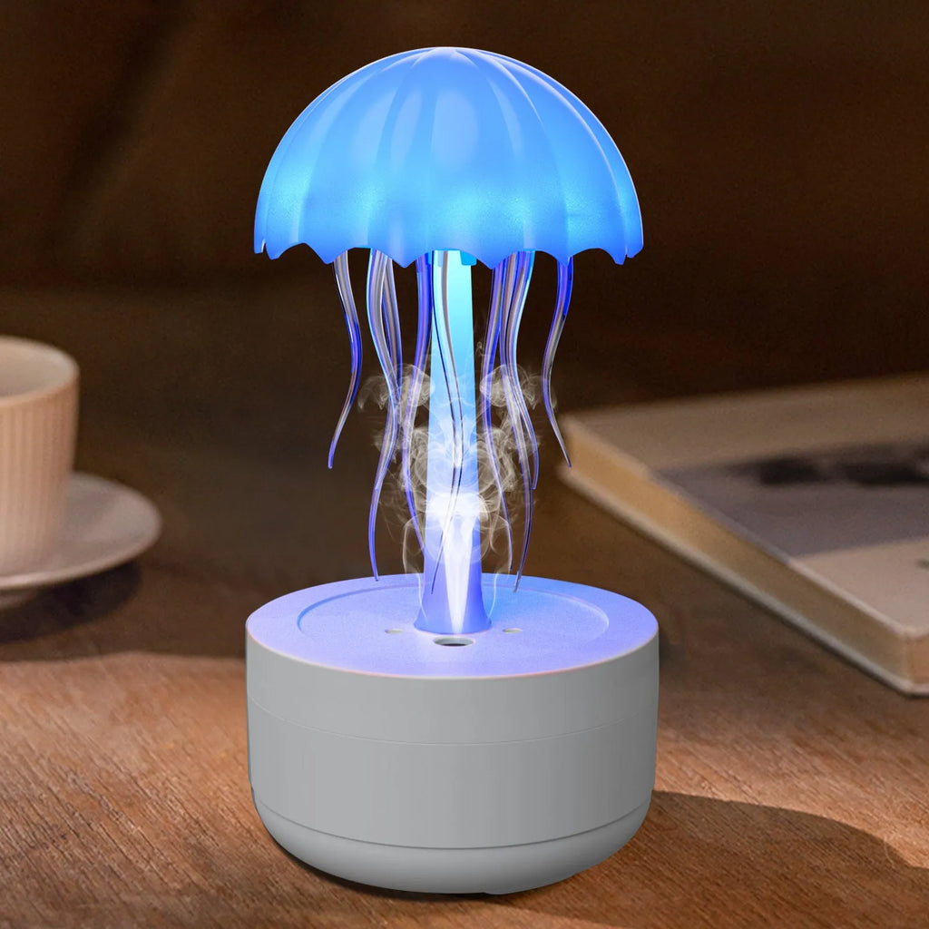 White resin jellyfish humidifier diffuser with 7-colour night light and touch controls on a desk