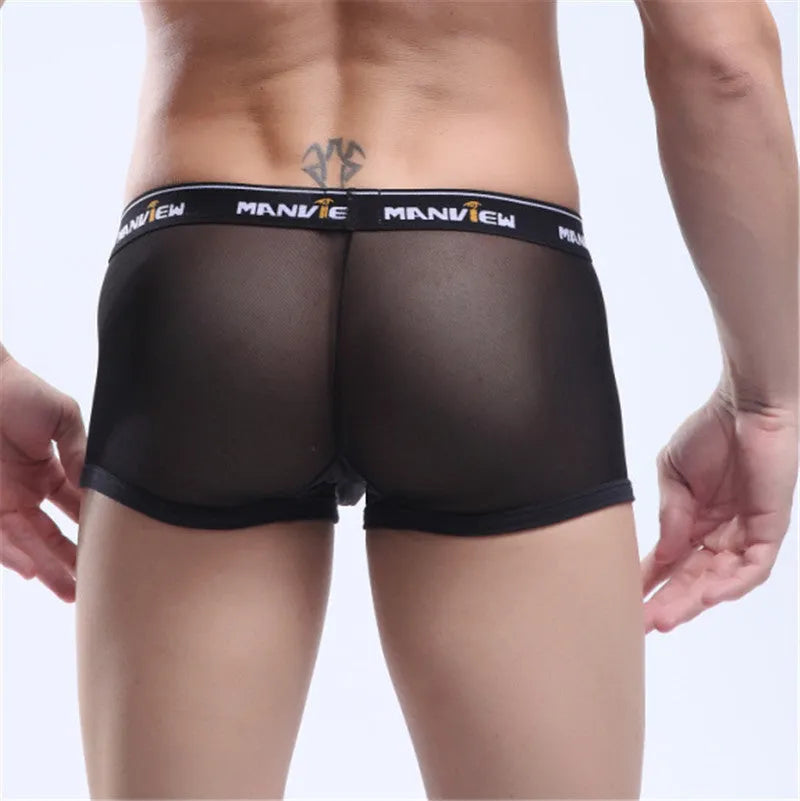 Solid colour men's mesh boxer underwear in black on a white background, showing elastic waistband