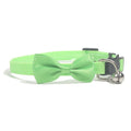 Adjustable nylon cat collar with bell decoration in multi-colour striped design
