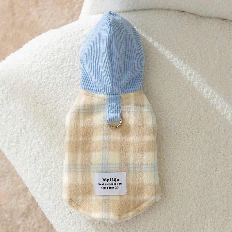 Blue corduroy chessboard grid pattern hooded vest for a dog on a neutral background