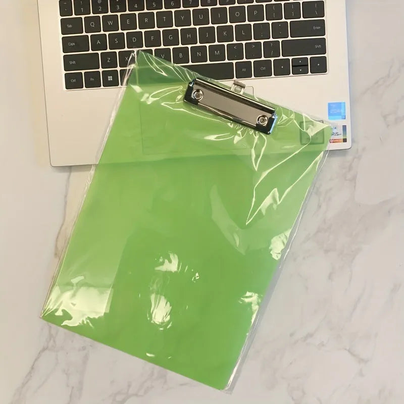 Transparent plastic A4 plate holder with metal clip and integrated writing board surface, shown in blue.