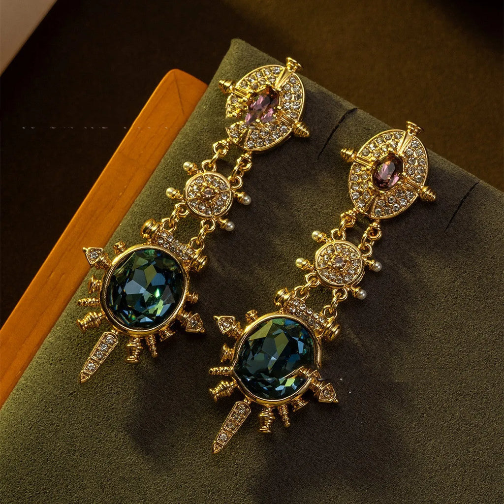 Gold geometric retro stud earrings with diamond finish on alloy material