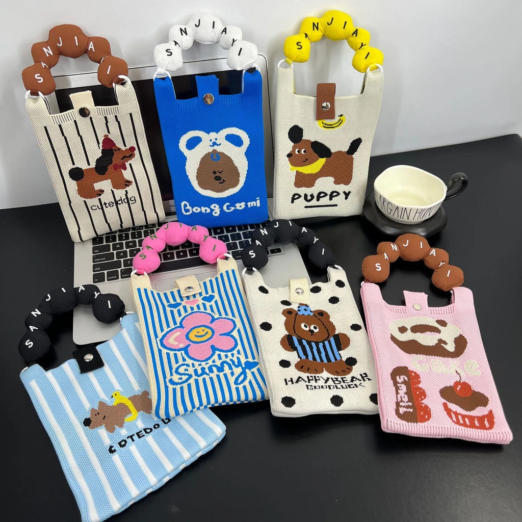 Cute cartoon knitted polyester messenger bag in square vertical shape with single shoulder strap, featuring an open pocket and mobile phone pocket.