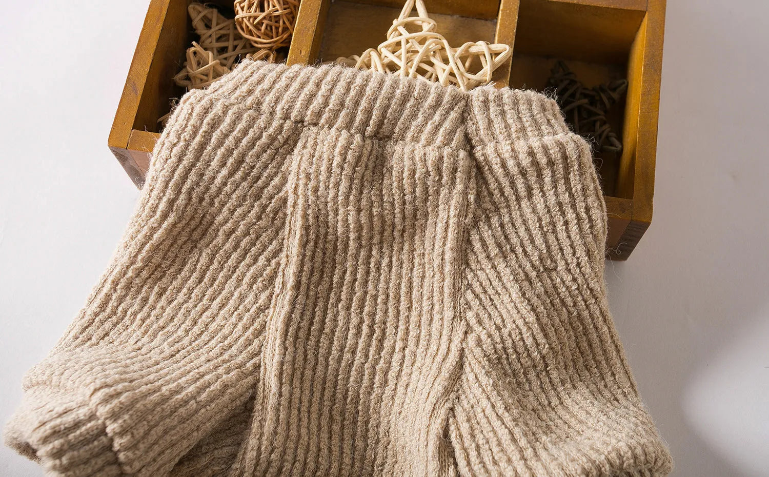 Brown cloth pullover sweater for small dog breeds on a mannequin