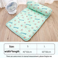 Blue cooling dog mat on floor with small dog lying on it, breathable ice silk cotton surface