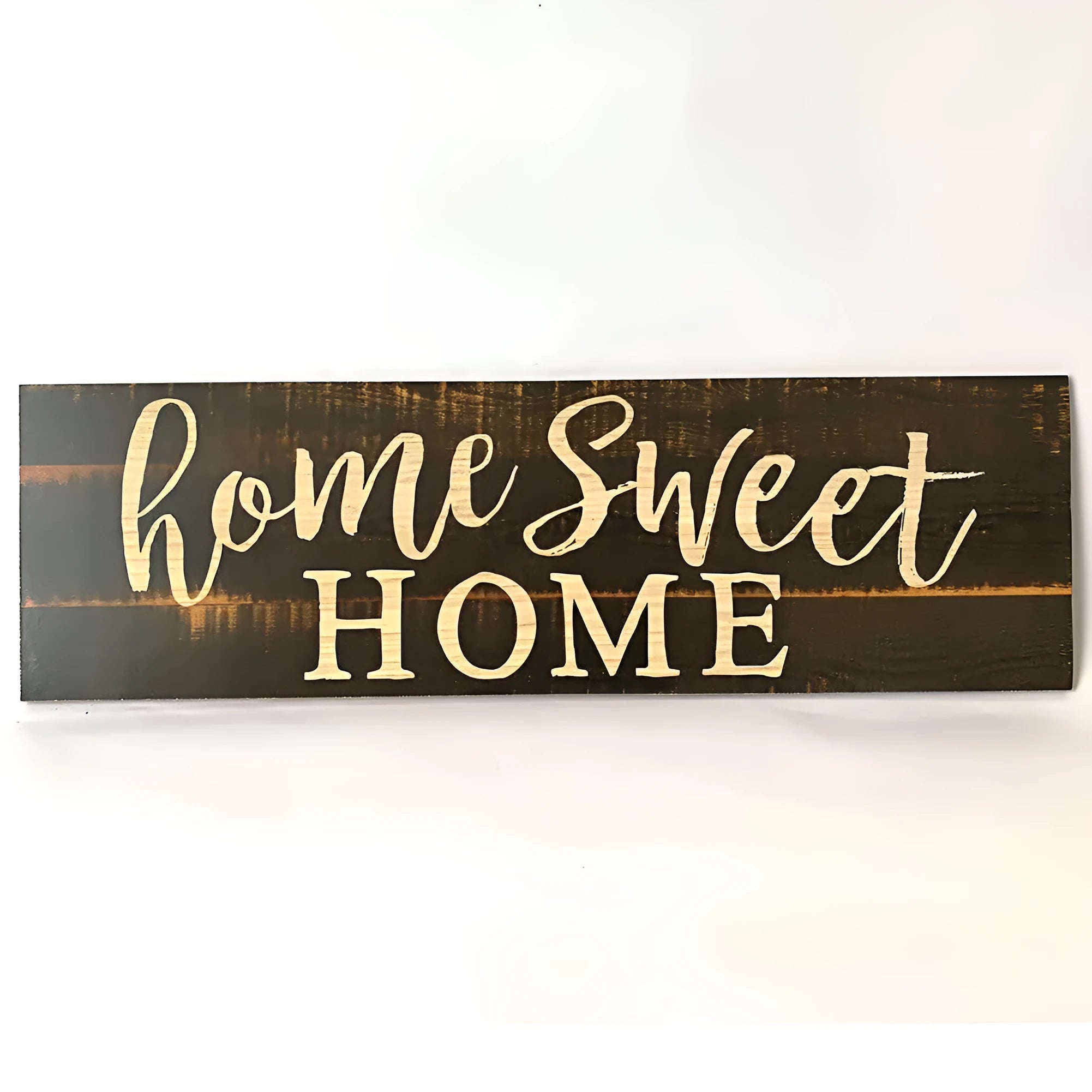 Home Sweet Home wooden carved pendant in black, 40cm x 12cm, hanging on a light wall