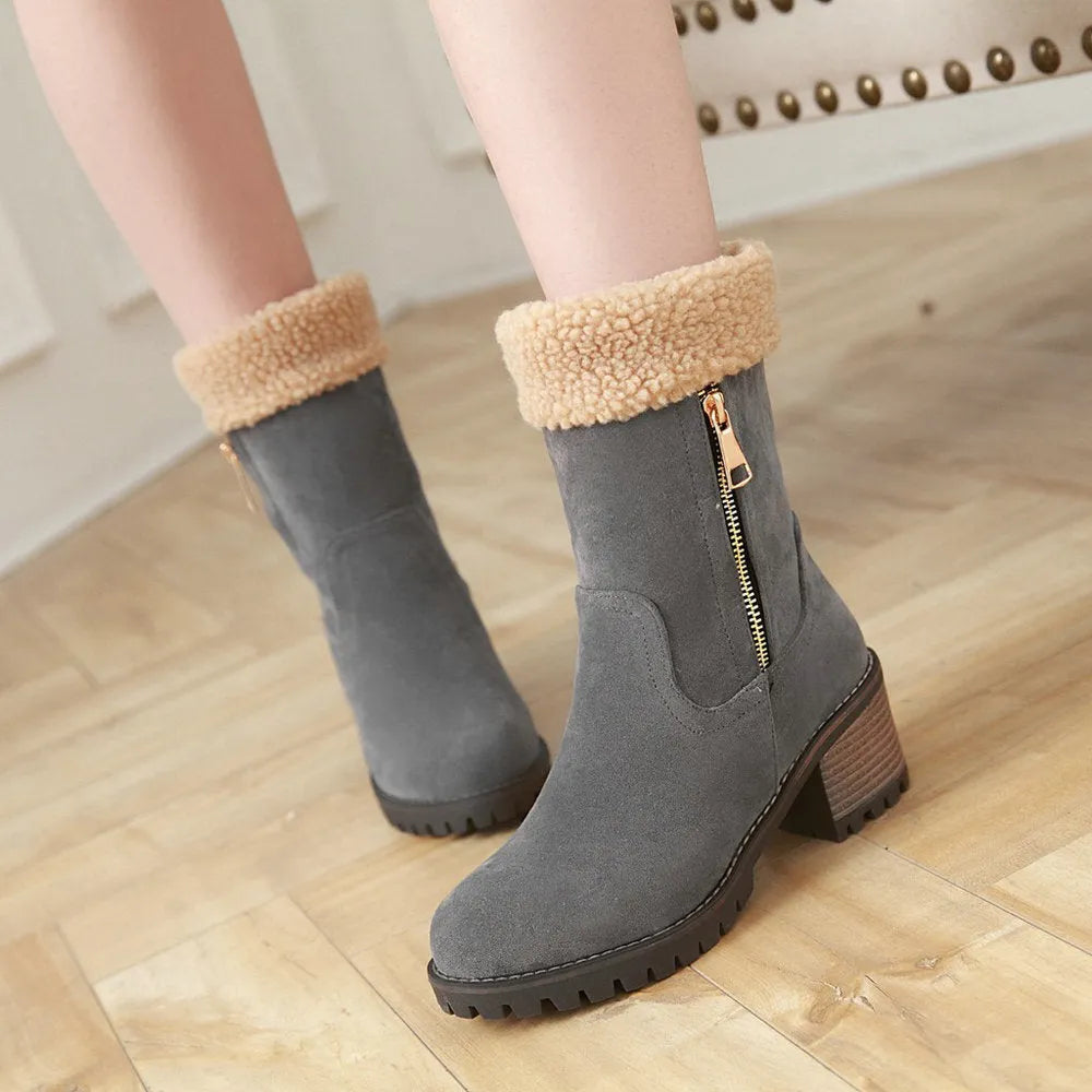 Snow boots with plush lining and rubber sole in black, grey, green, or orange.