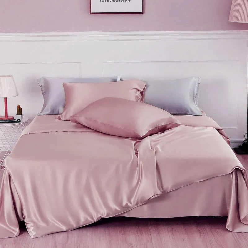 Solid colour silk duvet cover in lotus pink showing plain weave texture and double-sided design.