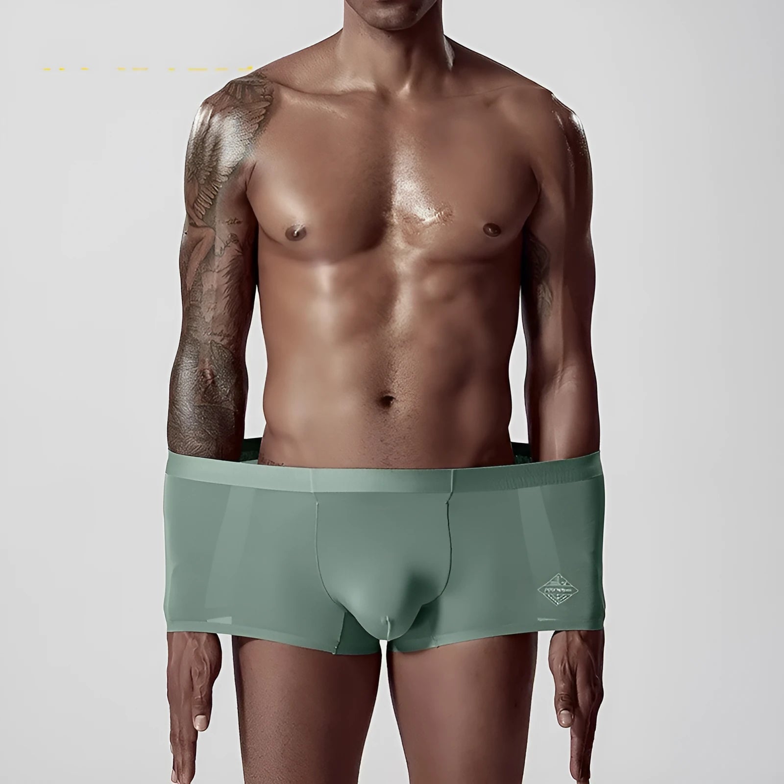 Men's seamless modal briefs in solid colour with mid waist design for body shaping