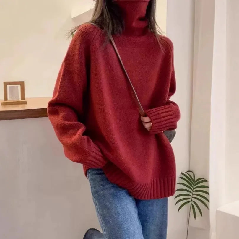 Women's thick loose turtleneck sweater with curling collar and 3D pattern in camel colour.