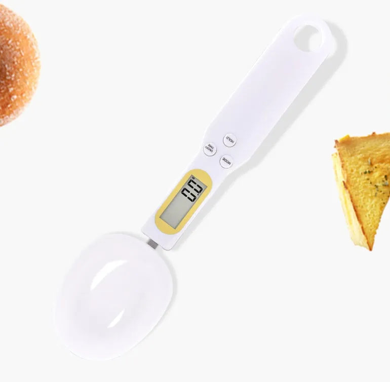 Household electronic measuring spoon scale with ABS plastic body and digital display on a kitchen surface