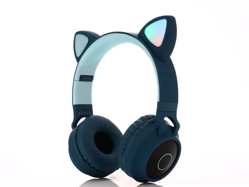 Pink wireless Bluetooth headset with large white cartoon cat ears on the headband