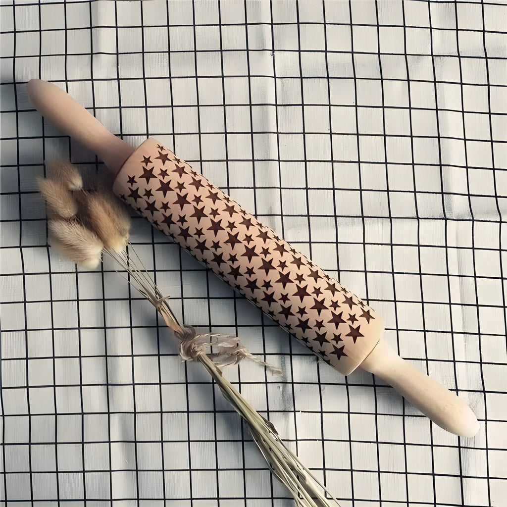 Natural wooden rolling pin with Christmas embossing patterns, 45 cm length, on a light background