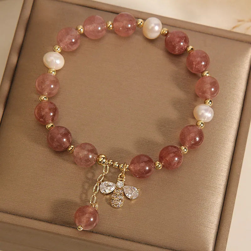 Women's freshwater pearl and strawberry quartz bracelet with zircon accents and adjustable closure