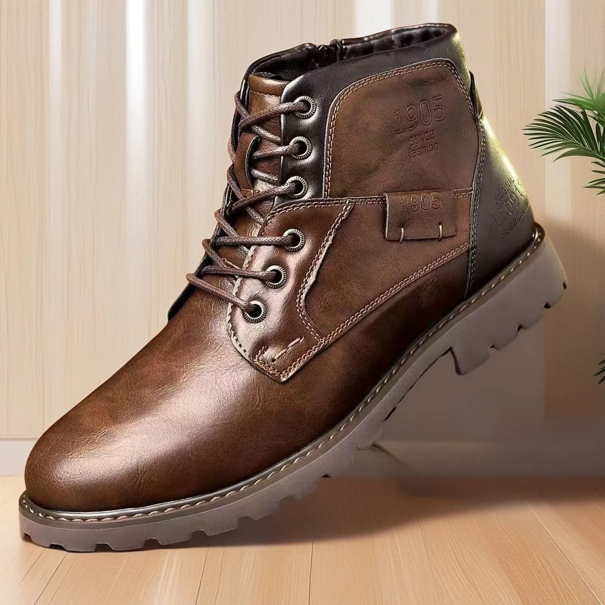 Men's black martin ankle boots with side zip, round toe, and rubber sole on a neutral background