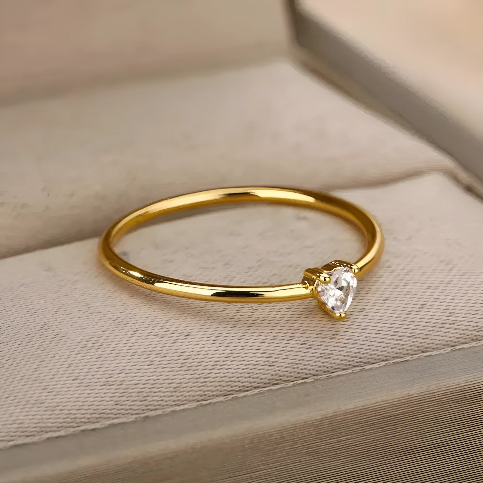 Women's 18K gold plated copper geometric heart zircon stacked ring, size No 7, on finger