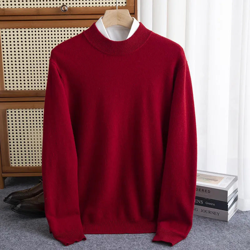 Man wearing a loose-fit half-collar wool sweater in a dark colour, showcasing the knit texture and collar style.