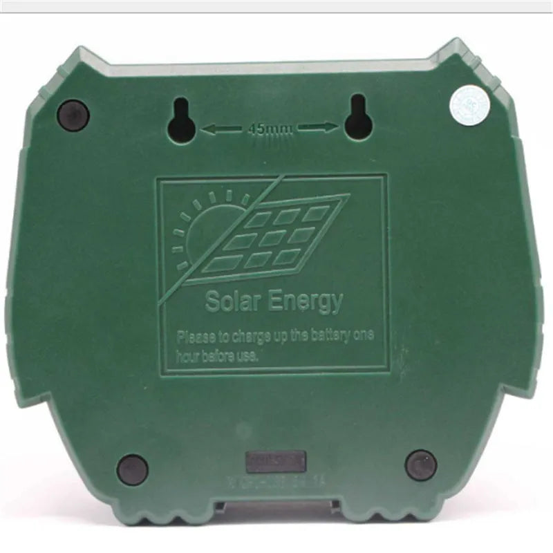 Green solar-powered ultrasonic animal repeller with LED strobe lights for outdoor pest control.